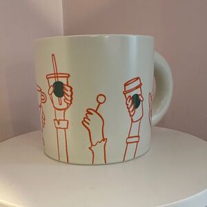Starbucks Mug Cheers 2025 Cup with Orange and Green Cheering Hands 12 oz.